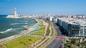 Corniche Casablanca coastline with beach, promenade, and ocean views at night